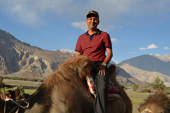 Riding a camel with 2 humps